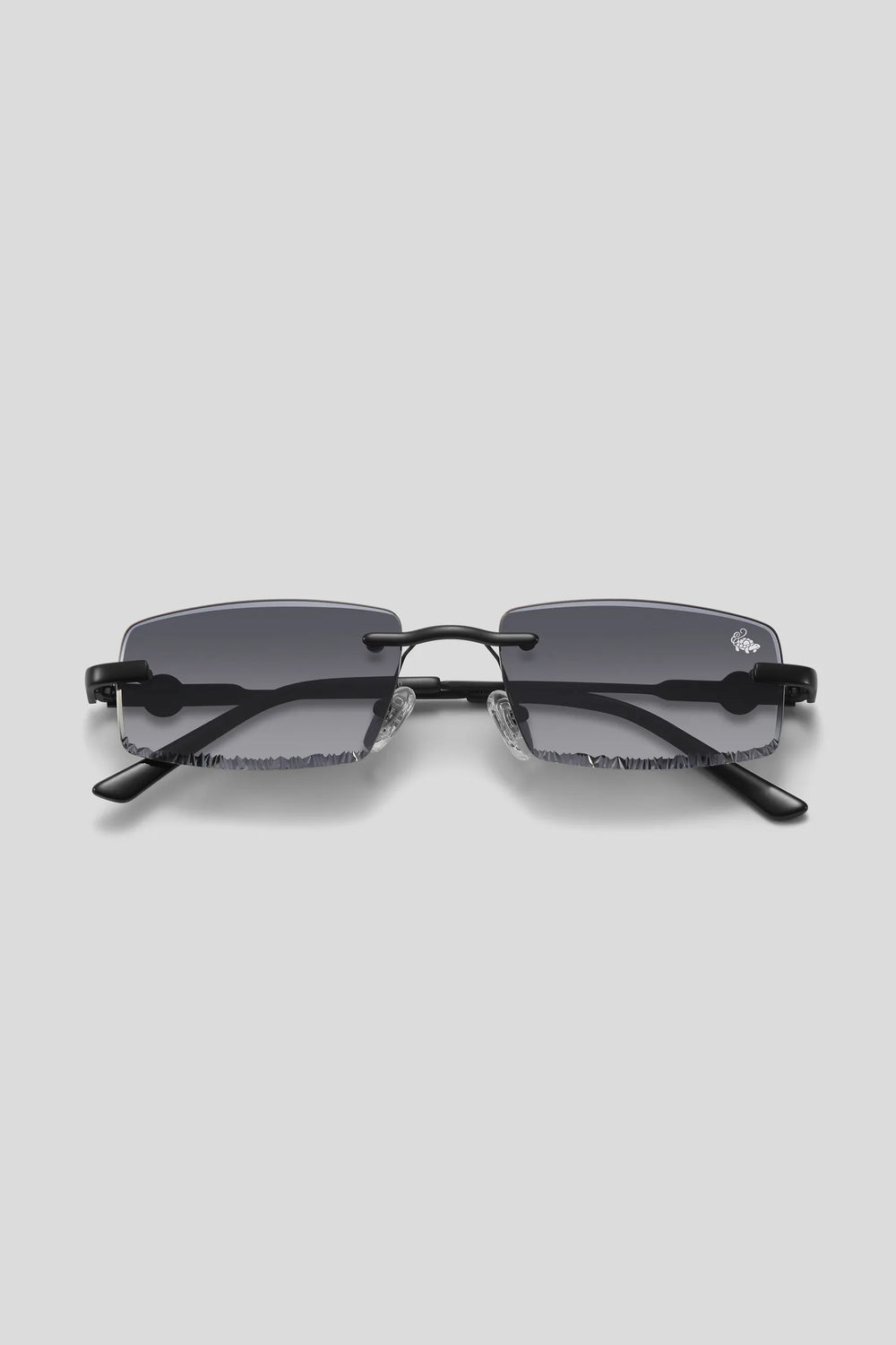 Belvoir&Co Diamond Cut Mabel black rimless sunglasses with smoke lenses